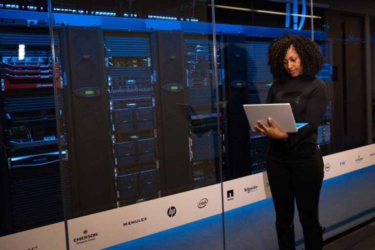 Systems administrator monitoring server configurations